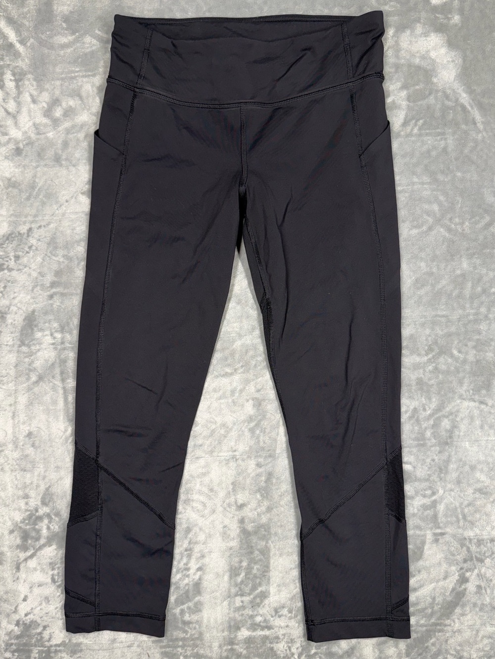 lululemon Pace Rival Crop legging black mesh paneling and zipper pocket